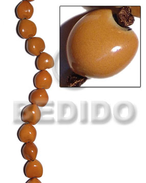 kukui seed / mustard / 16 pcs. per strand - Kukui Lumbang Nuts Beads