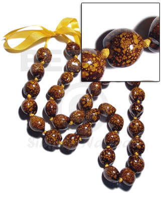 32 pcs. of kukui nuts in high polished paint gloss marbleized dark brown/yellow combination  in matching ribbon /lei / 36in - Leis