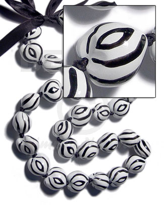 kukui seeds in animal print / zebra / 30 pcs. / in adjustable ribbon  the maximum length of 54in - Leis