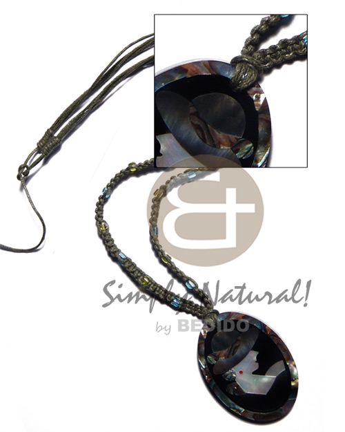 olive green macrame cord and 50mmx38mm oval pendant /elegant hat lady delicately etched in shells - brownlip, blacklip and paua combination in jet black laminated resin / 5mm thickness / adjustable - Macrame Necklace