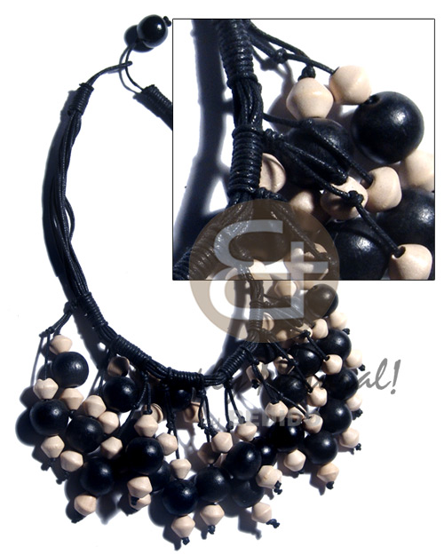 cleopatra / 15 r0ws wax cord  dangling 15mm round black nat.wood beads & 10mm saucer nat. wood beads / black and white tones - Multi Row Necklace