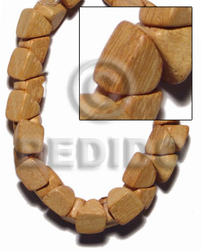 "nangka" barrel double slidecut 11mm  / 57 pcs. per 16 in. str. - Slide Cut Wood Beads