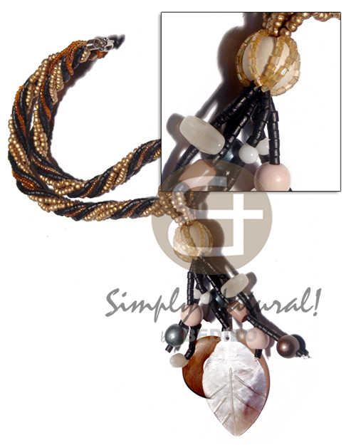 6 layers twisted 2-3mm coco Pokalet in metallic gold, 2-3mm coco heishe black, amber glass beads  tassled wood beads. wood ring 35mm and hammershell 50mmx30mm leaf / 16 in. plus 2.5in. tassles - Twisted Necklace