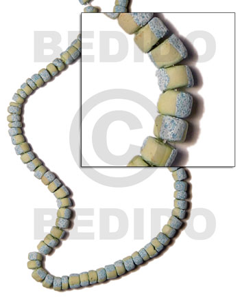 hand made 4-5mm coco pokalet. subdued yellow Coco Pokalet Beads