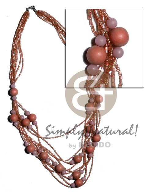 5 rows  graduated multilayered  cut glass beads   buri seeds and wood beads accent/ light orange tones / 32 in - Graduated Necklace