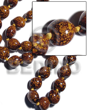 16 pcs. of kukui nuts in high polished paint gloss marbleized dark brown/yellow combination - Kukui Lumbang Nuts Beads