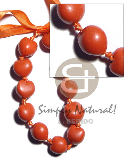 Kukui nuts in pearlized orange Kukui Necklace