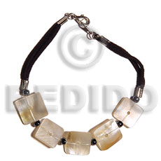 sq. cut hammershell on wax cord - Shell Bracelets